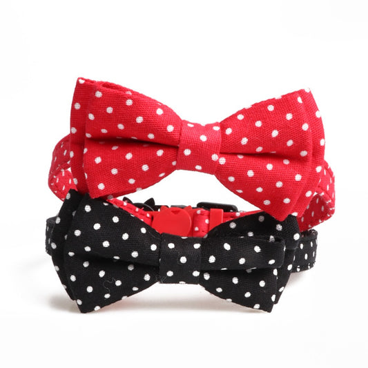 Mokka adjustable cat collar with a red polka dot bow tie on a white background