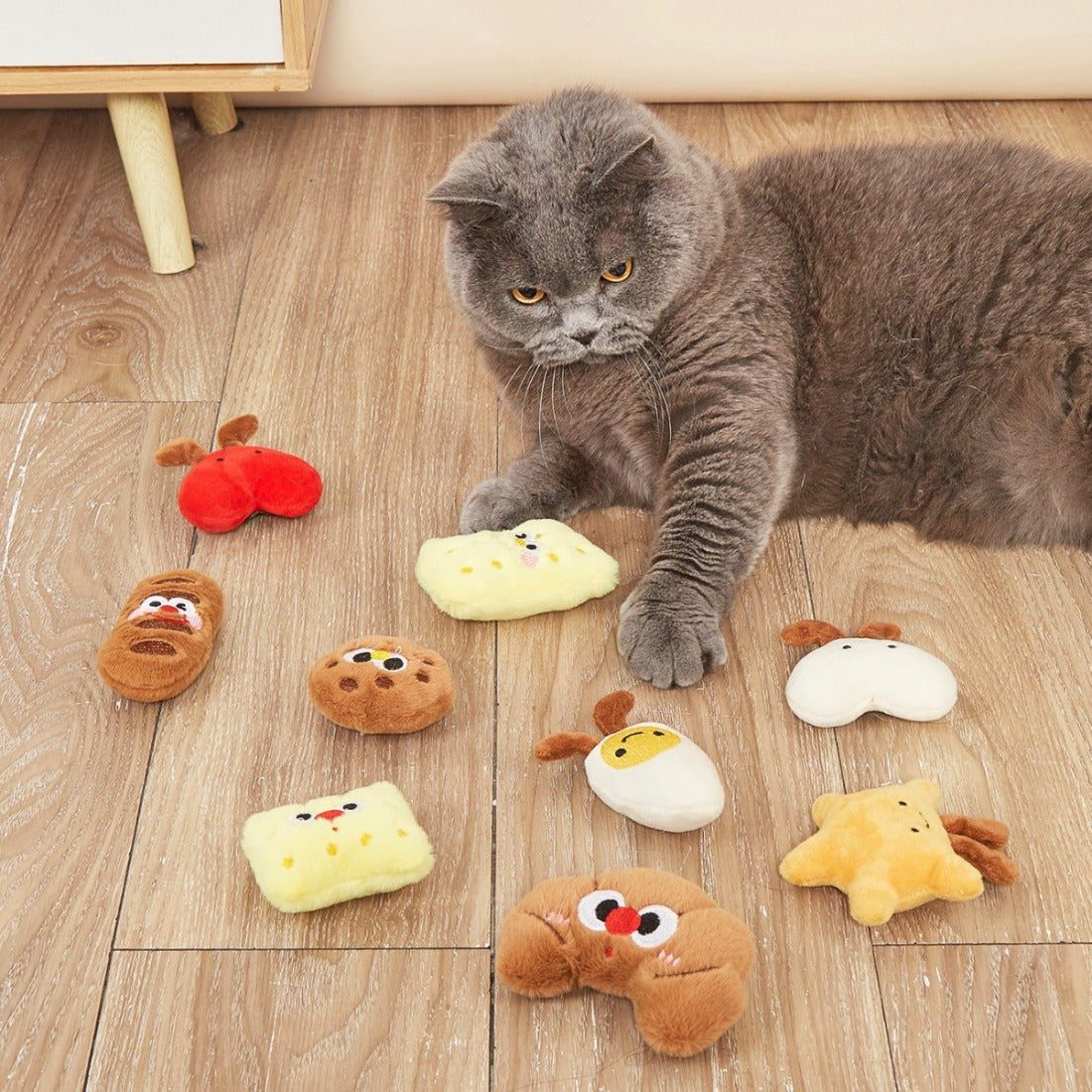 Moo cat toy with colorful feathers for interactive play and chasing
