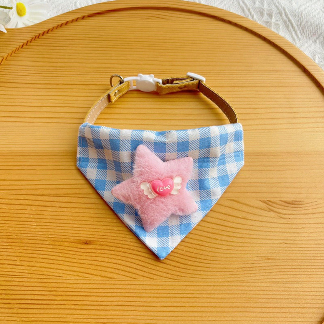 Mokka blue gingham cat bandana displayed with measuring tape for size reference