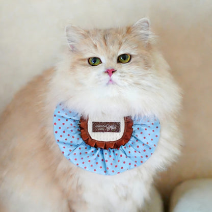 Close-up of leopard ruffle cat bib showing fabric texture and pattern