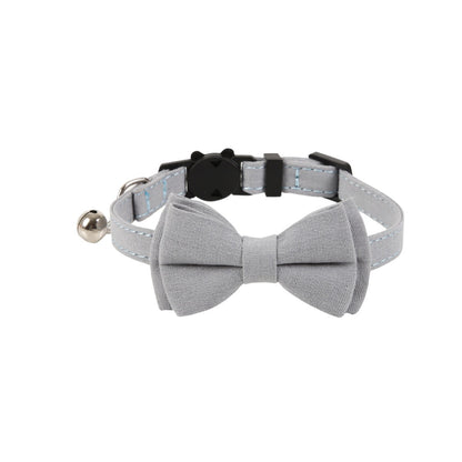 Mokka cat collar featuring a solid color bow and attached bell