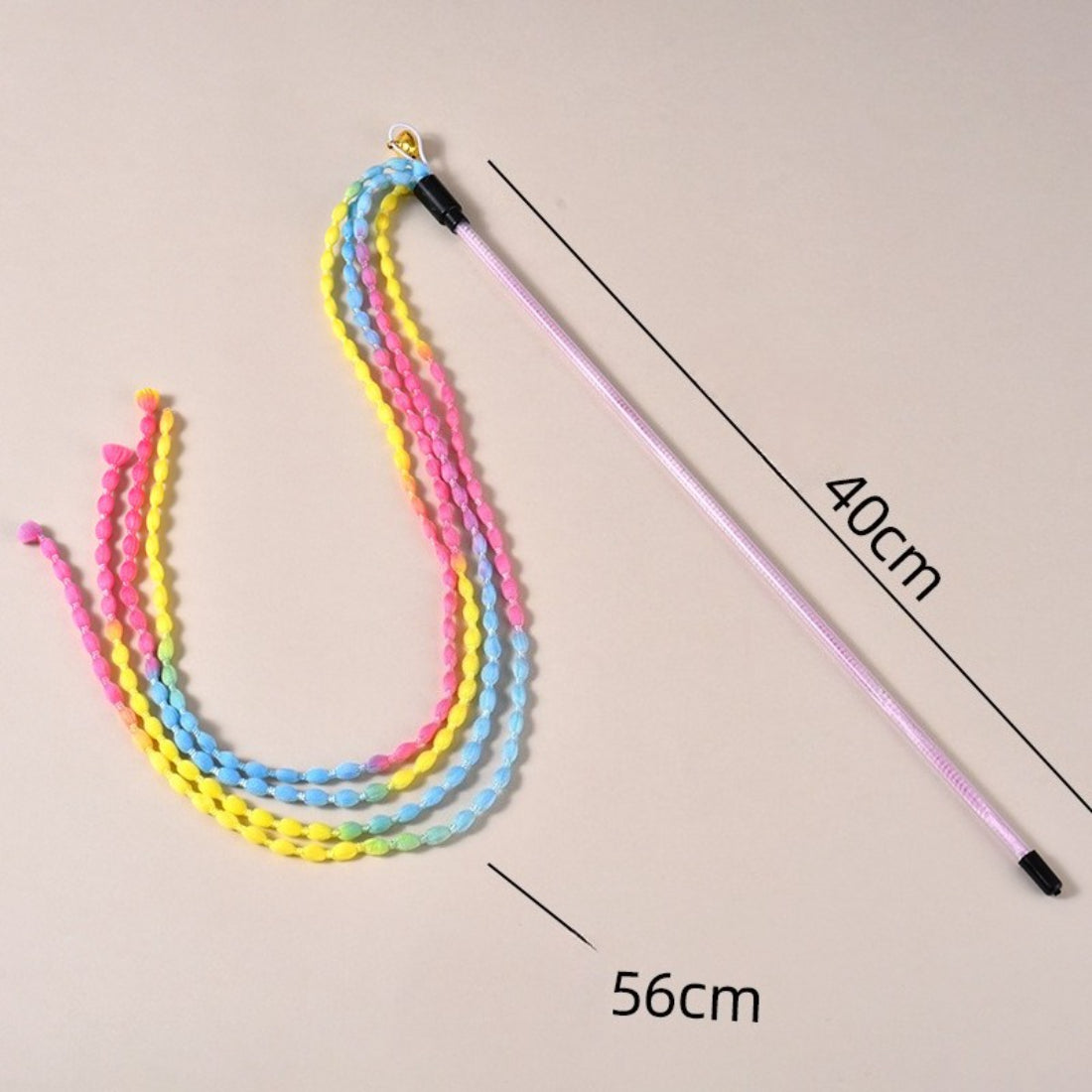Moo braided cord cat teaser wand held in hand displaying flexible braided handle