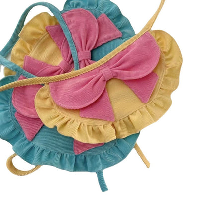 Mokka decorative pet bandana displayed flat highlighting bow and ruffles