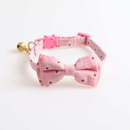 Mokka floral cat collar shown in both bowtie and bandana styles
