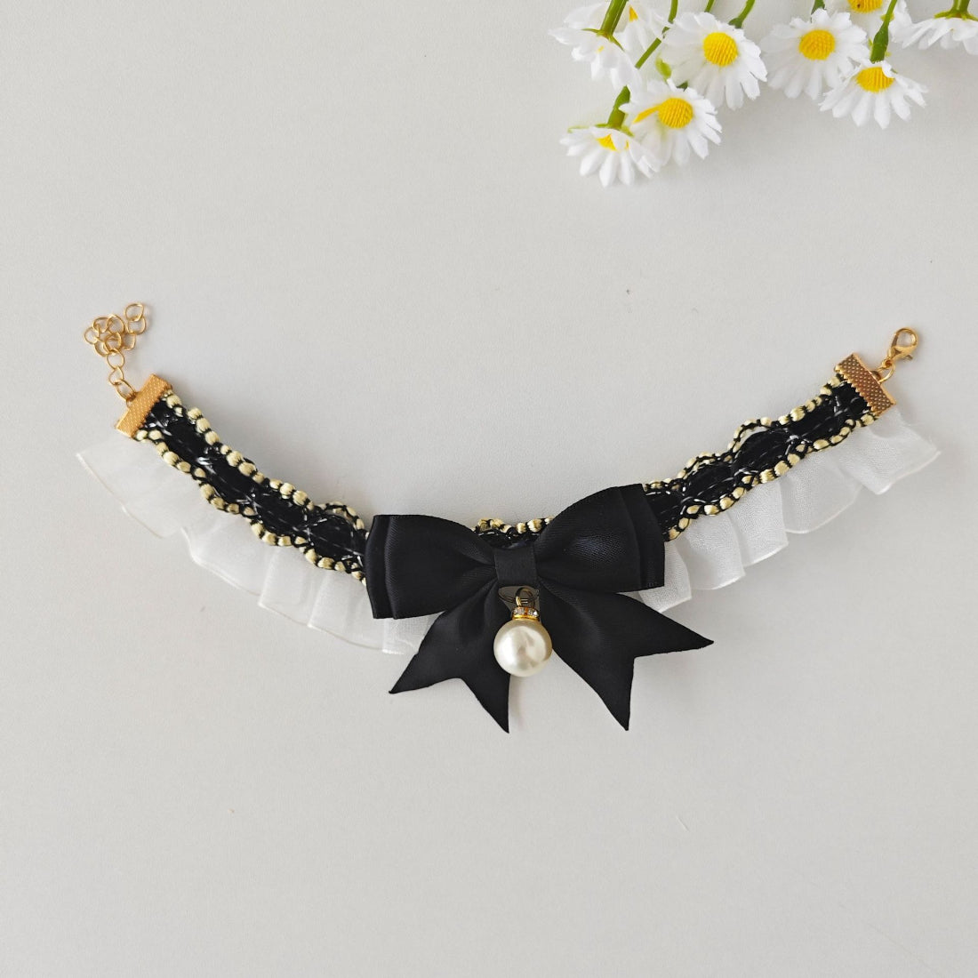 Mokka cat collar showing metal buckle and bell attachment