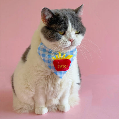 Mokka blue gingham cat bandana folded neatly on wooden surface