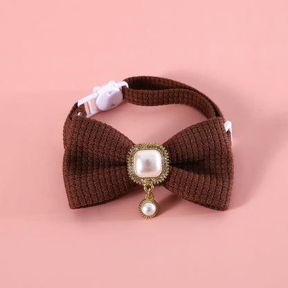 Mokka vintage style bow cat collar close-up showing bow and strap texture