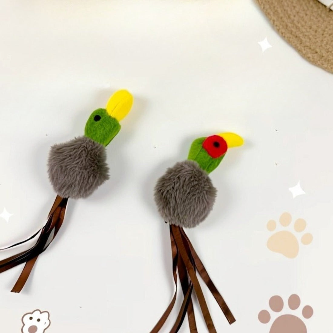 Moo bird cat toy attached to a wooden stick for interactive play