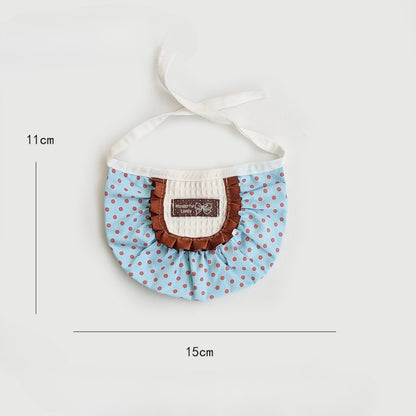Leopard ruffle cat bib displayed flat highlighting ruffle edges and shape