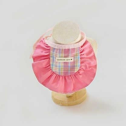 Mokka plaid ruffle cat bib styled with a collar on a white background