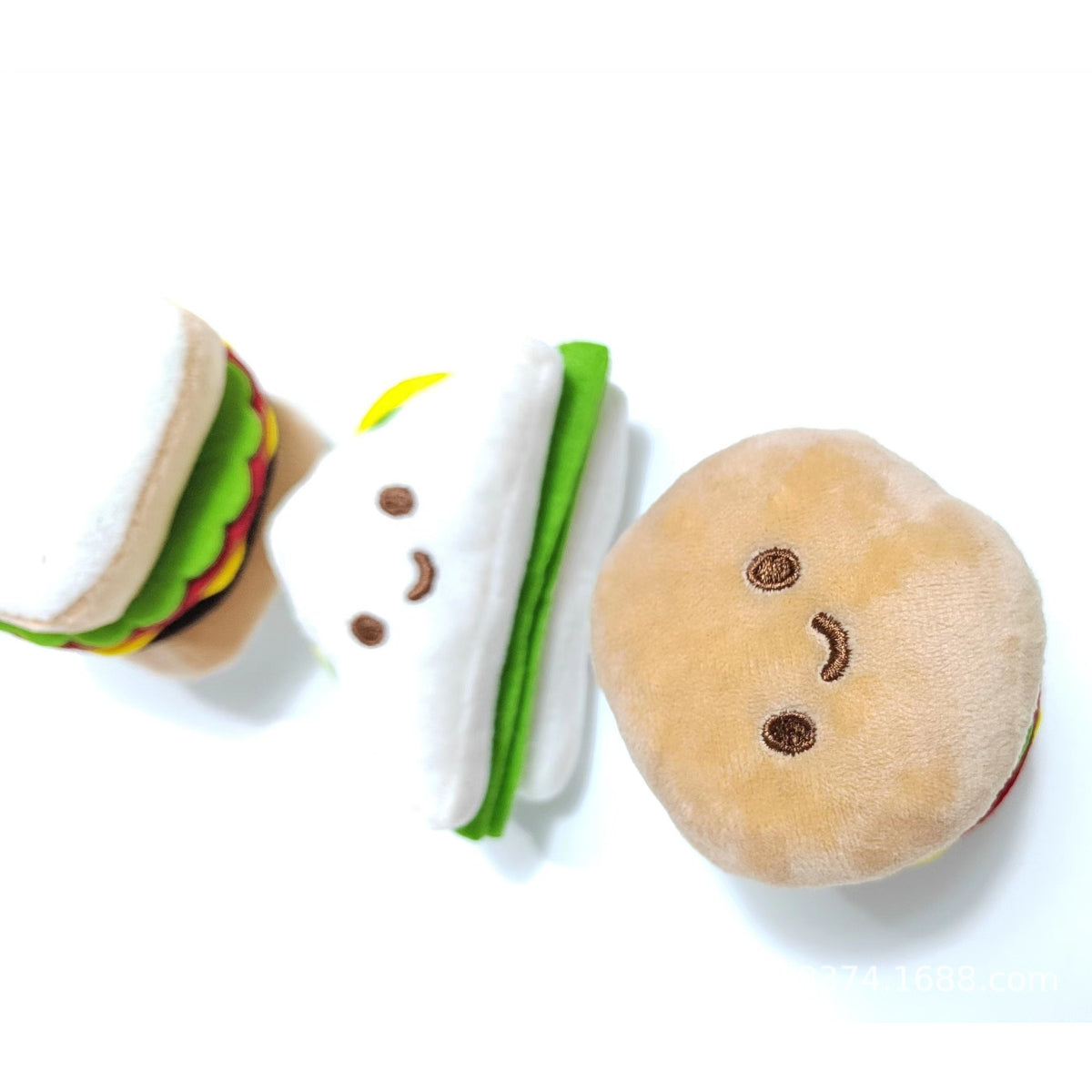 Side view of Moo plush hamburger cat toy highlighting the bun and lettuce layers