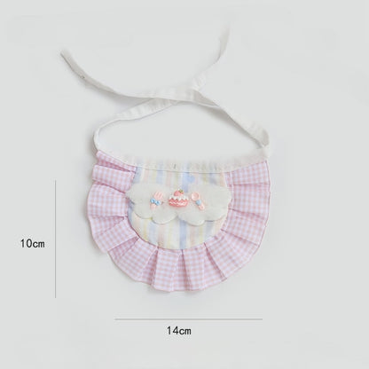 Mokka Cake Charm Cat Bib displayed flat highlighting the full design and colors