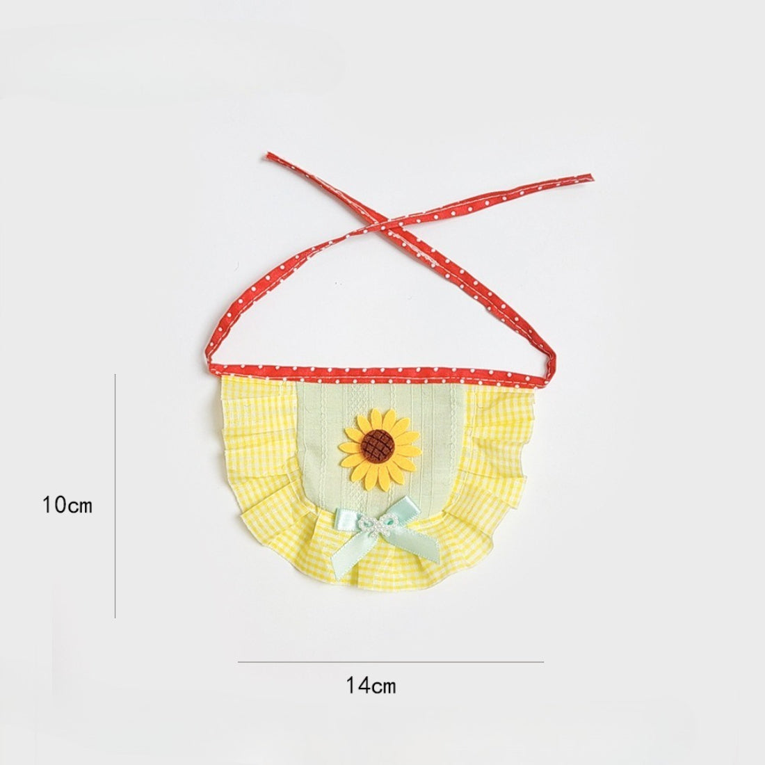 Mokka cat bib worn by a cat with sunflower design and ruffled edges