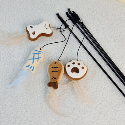 Close-up of the brown cookie plush on the cat teaser wand with detailed stitching