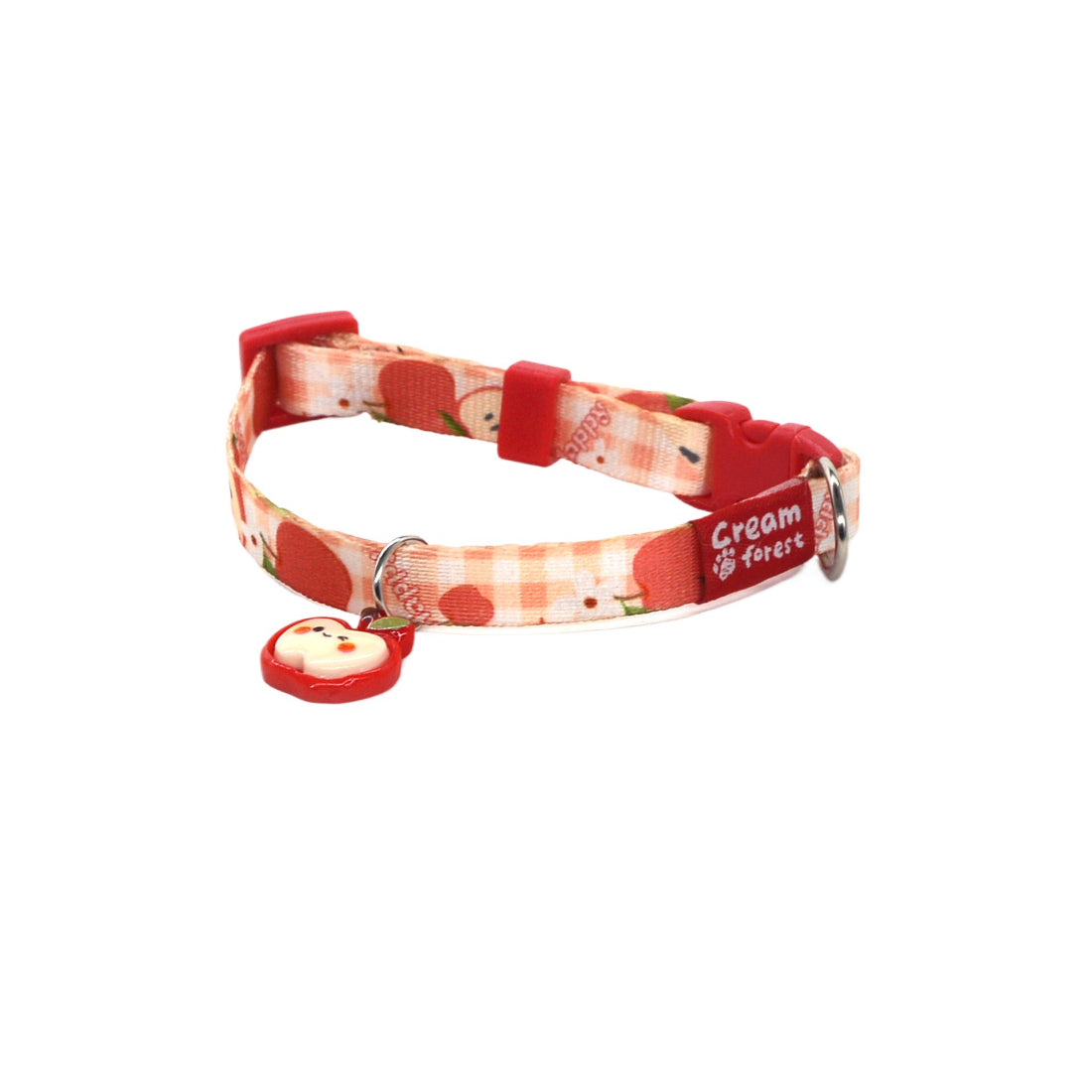 Close-up of the apple charm on the Mokka brown cat collar