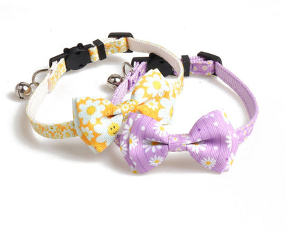 Mokka floral bow tie cat collar with bell displayed with bow tie facing forward