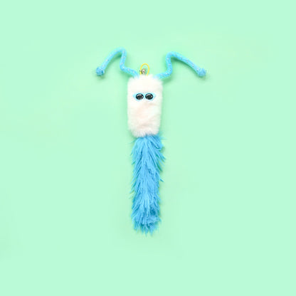 Close-up of Moo interactive fuzzy character toss cat toy showing texture and colors
