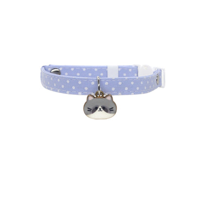 Side view of pink breakaway collar featuring Mokka cat face charm and bell