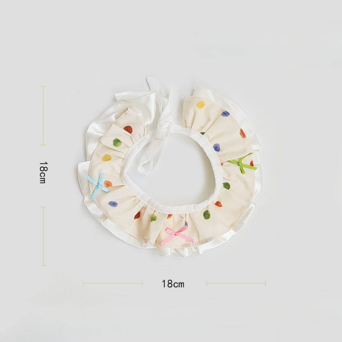 Mokka Colour Spot Cat Neck Bib packaging showing product branding and design
