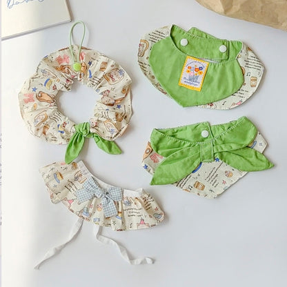 Mokka bib with colorful cartoon cat print on white background
