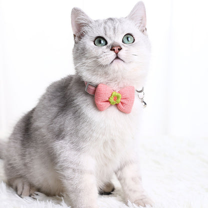Mokka adjustable cat collar bowtie shown coiled on plain surface
