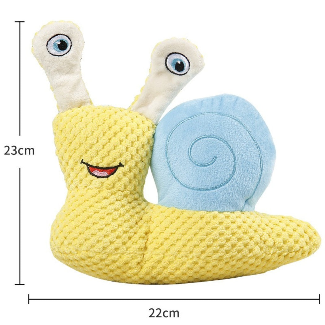 Close-up of Petkin Snail Plush Dog Toy showing detailed snail face and shell