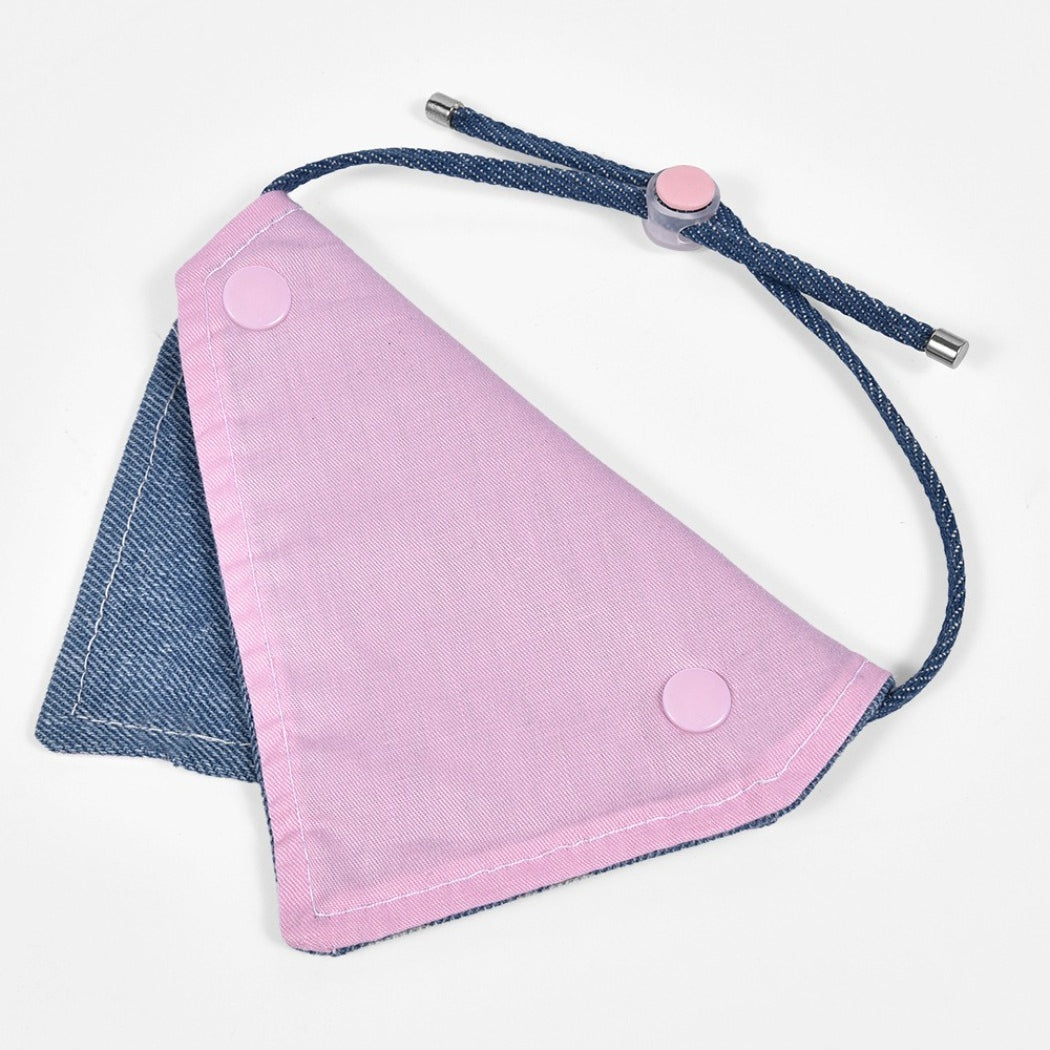 Mokka cat looking up while wearing button detail bandana