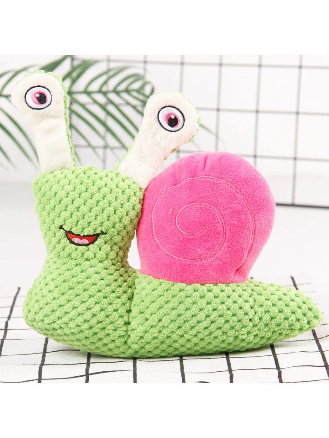 Petkin Snail Plush Dog Toy with bright colors and soft plush material