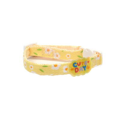 Mokka Daisy Charm breakaway cat collar worn by a cat, showing charm and fit