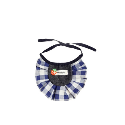 Strawberry gingham cat bib folded neatly with a small tag attached