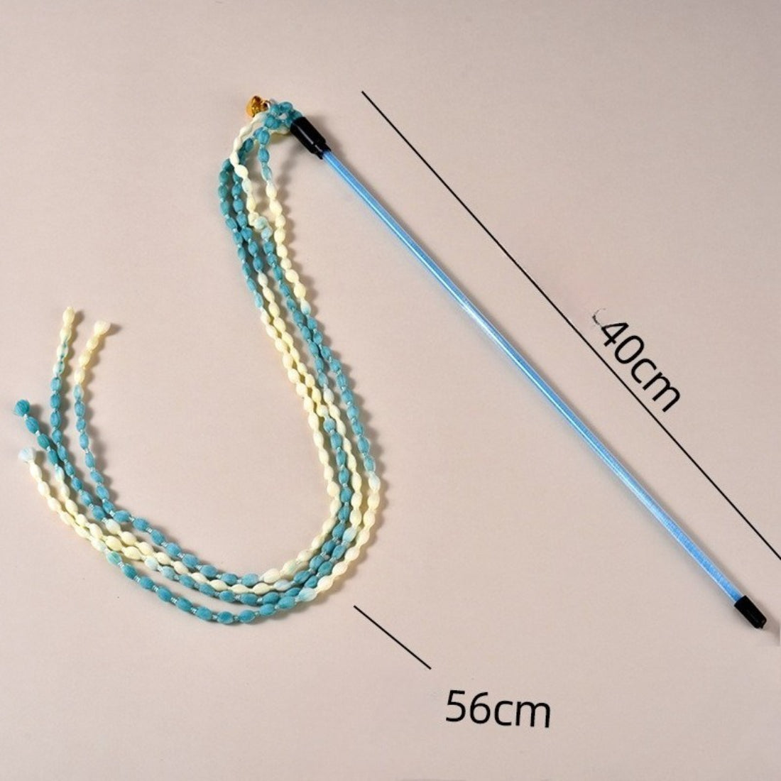 Moo cat teaser wand with braided cord handle and dangling teaser string on white background