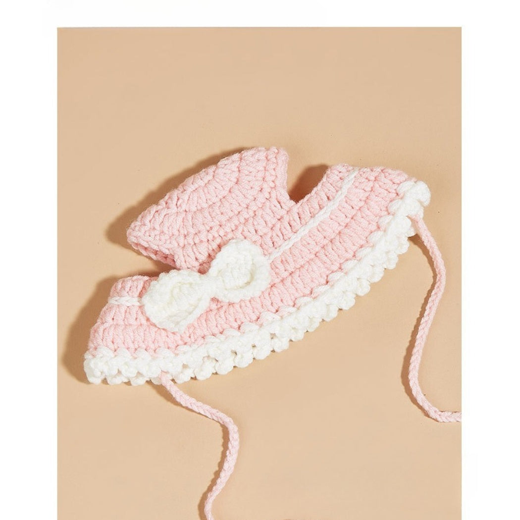 Top view of Ozzie pink crochet cat hat showing overall shape and texture