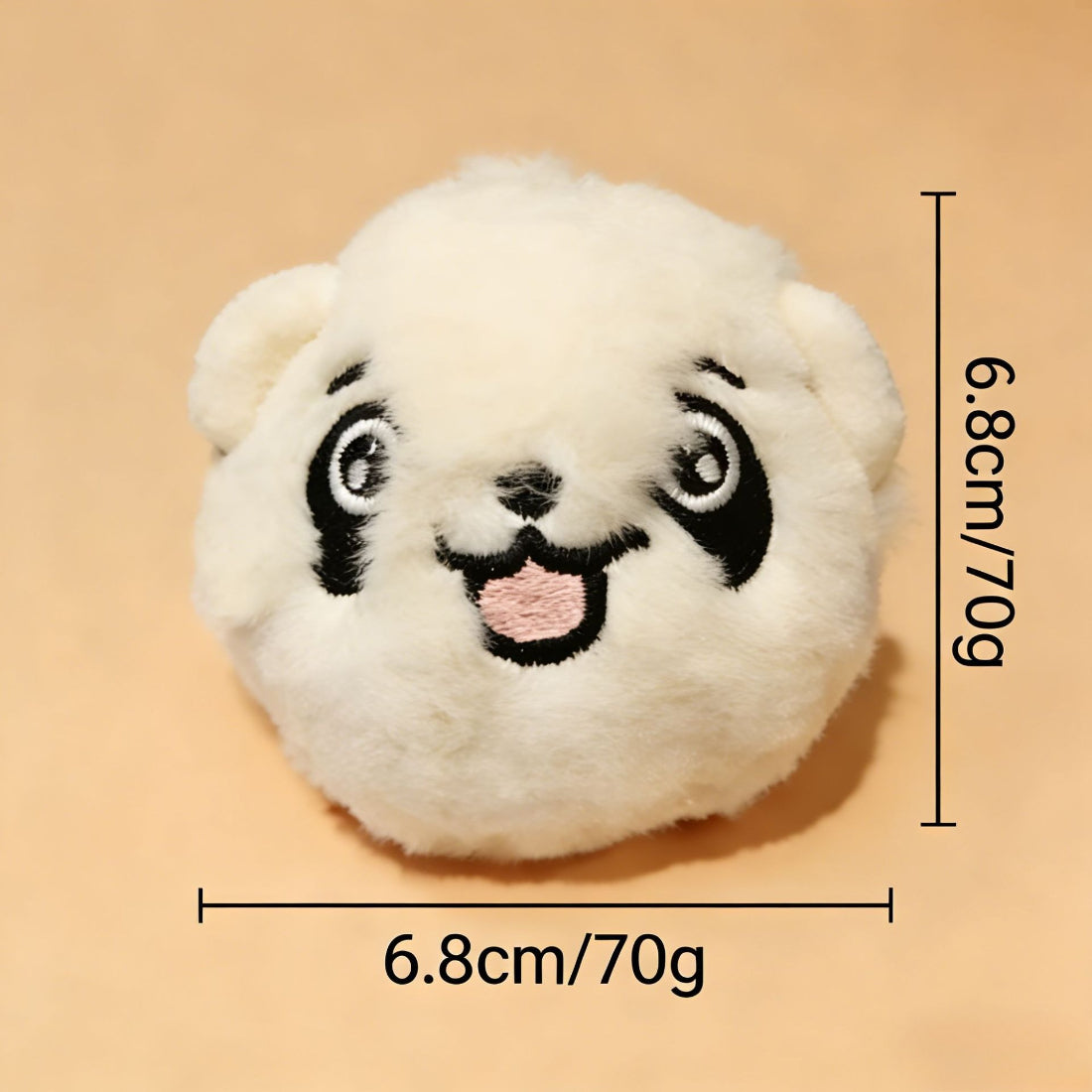 Petkin soft plush ball dog toy on white background angled to show shape
