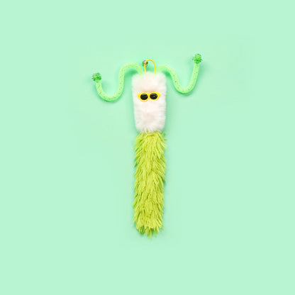 Moo interactive fuzzy character toss cat toy positioned upright on plain surface