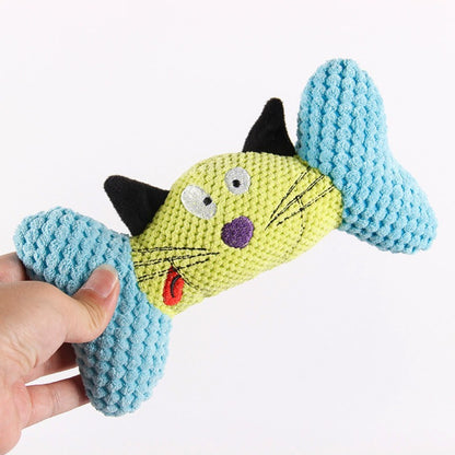 Close-up of colorful cat character plush toy showing detailed facial features