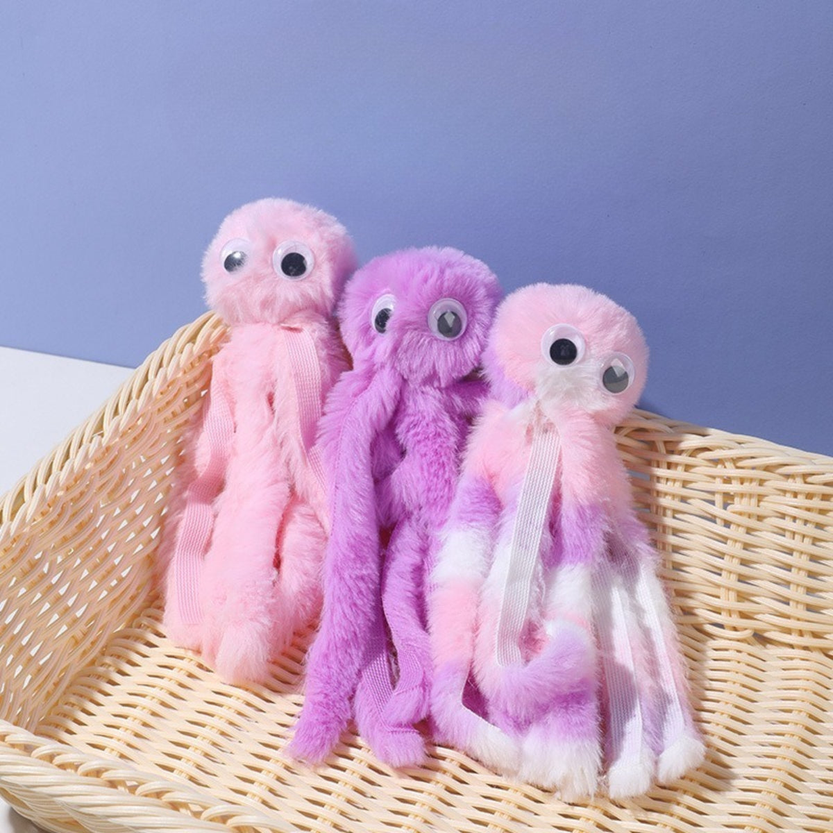 Petkin plush octopus cat toy with purple body and multiple tentacles