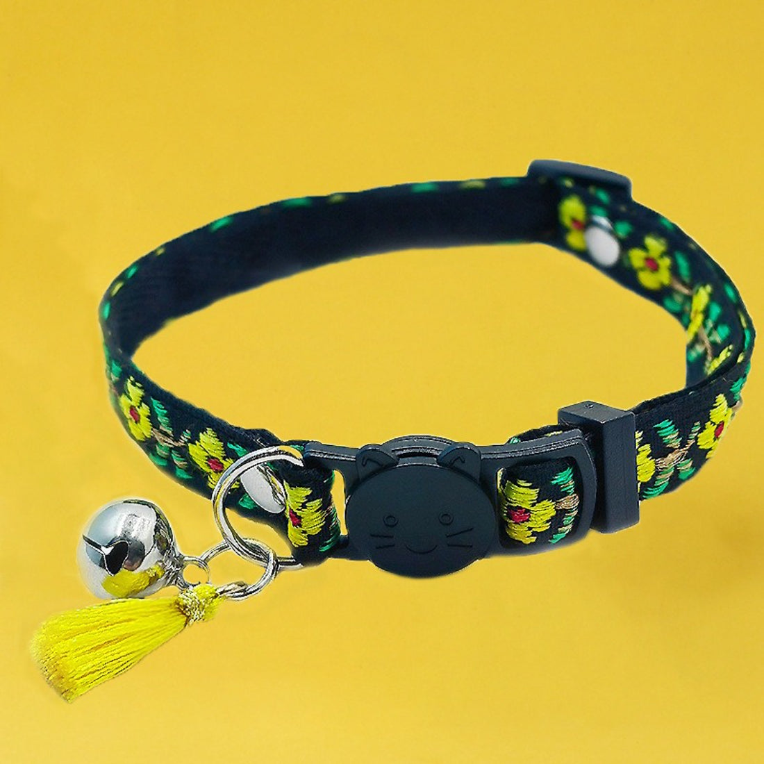 Side view of Mokka colorful floral cat collar featuring tassel and bell