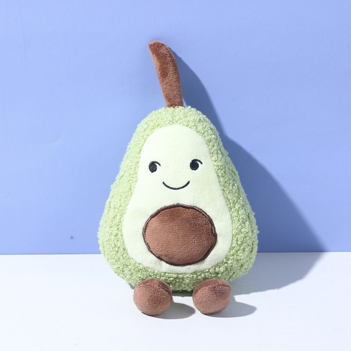 Petkin Plush Flip Vegetable Dog Toy with bright green and orange colors displayed