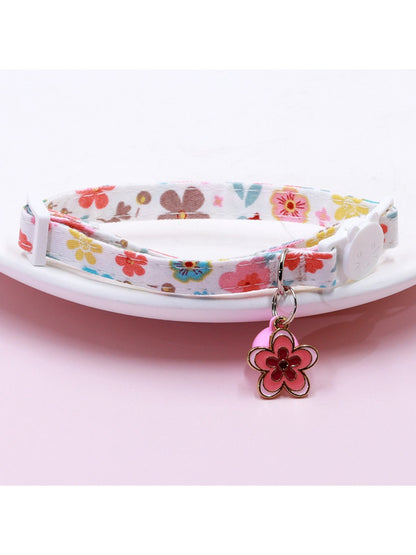 Mokka Floral Charm Bell Cat Collar displayed flat with floral design and bell attached