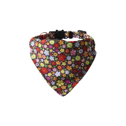 Mokka floral cat bib with bell shown laid flat with floral pattern visible