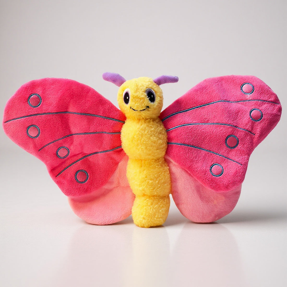 Butterfly plush toy displayed on a white background showing full shape