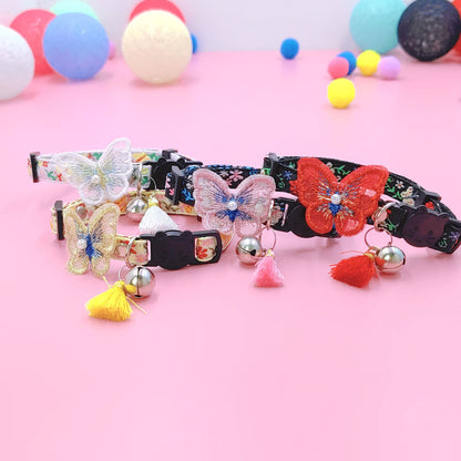 Mokka Butterfly Anti-Choking Adjustable Cat Collar coiled with butterfly design visible