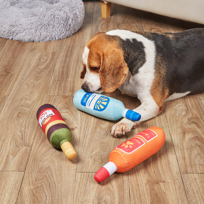 Close-up of Petkin Wine Bottle Squeaky Dog Toy showing red bottle shape with green top