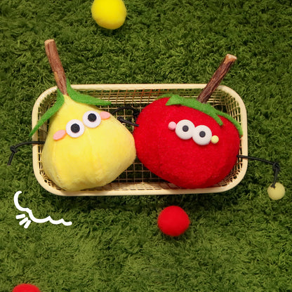 Moo cat toy designed as a yellow banana character with a smile