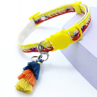 Side view of Mokka floral adjustable cat collar with visible fringe accents