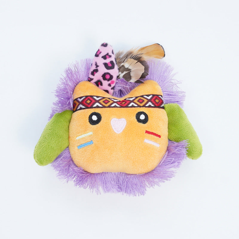 Moo Boho Feather Face Plush Cat Toss Toy displayed on a wooden surface