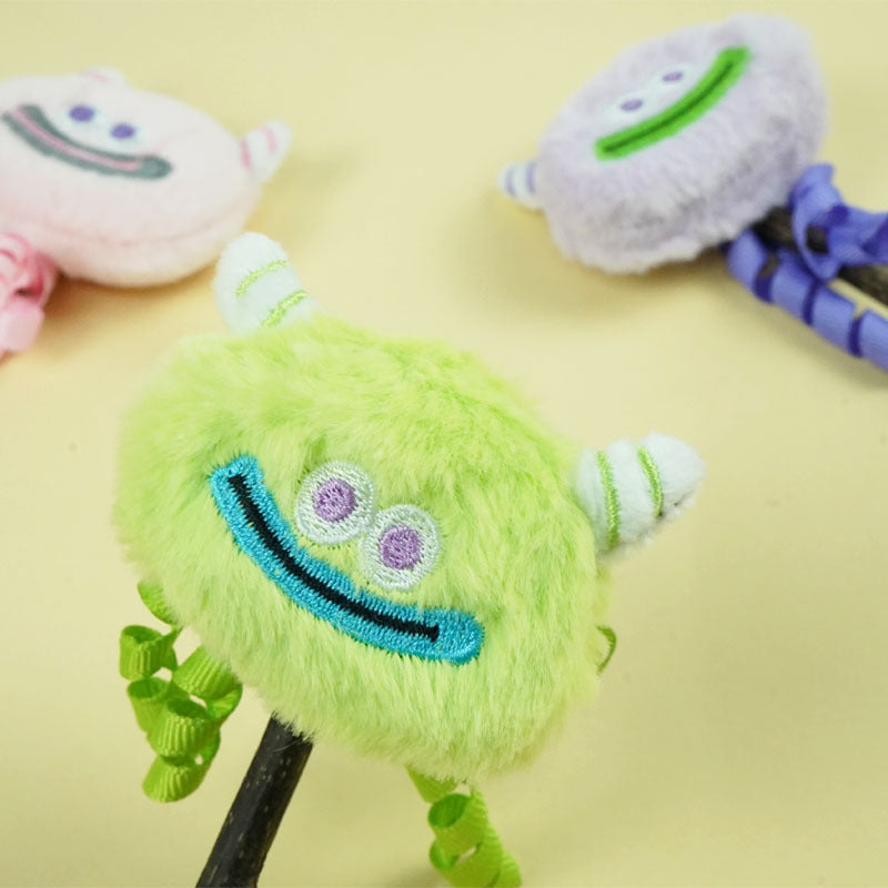 Moo cat toy stick with monster face and multicolored feathers for interactive play