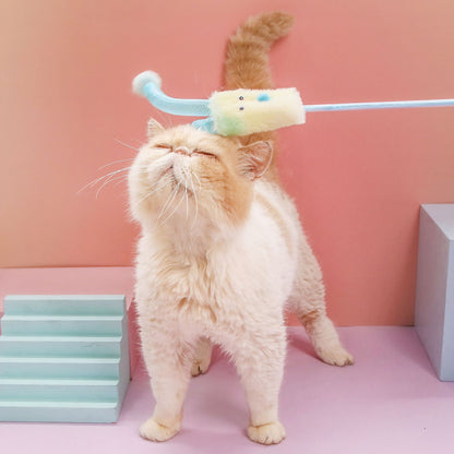 Moo Interactive Jester Wand Cat Toy held by a hand showing size and shape