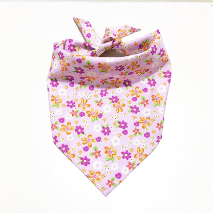 Furbud floral pet bandana folded to show pink and white floral pattern