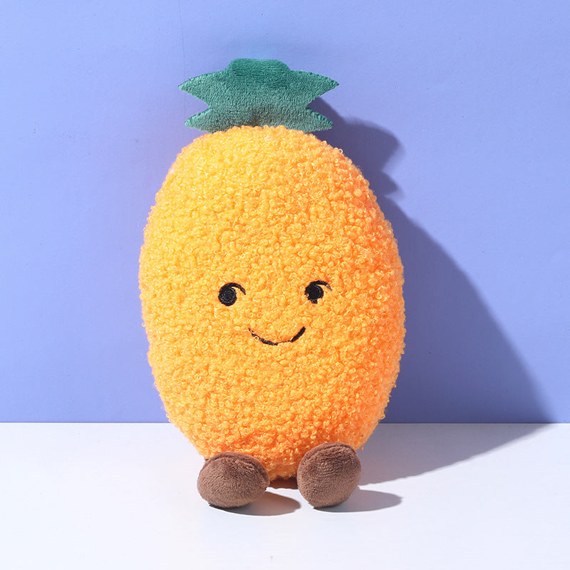 Petkin Plush Flip Vegetable Dog Toy held by a hand showing size comparison
